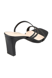 Product shot of the Ginny Heel - Black in colour Black, from the back