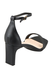 Product shot of the Gimlet Heel - Black in colour Black, from the back