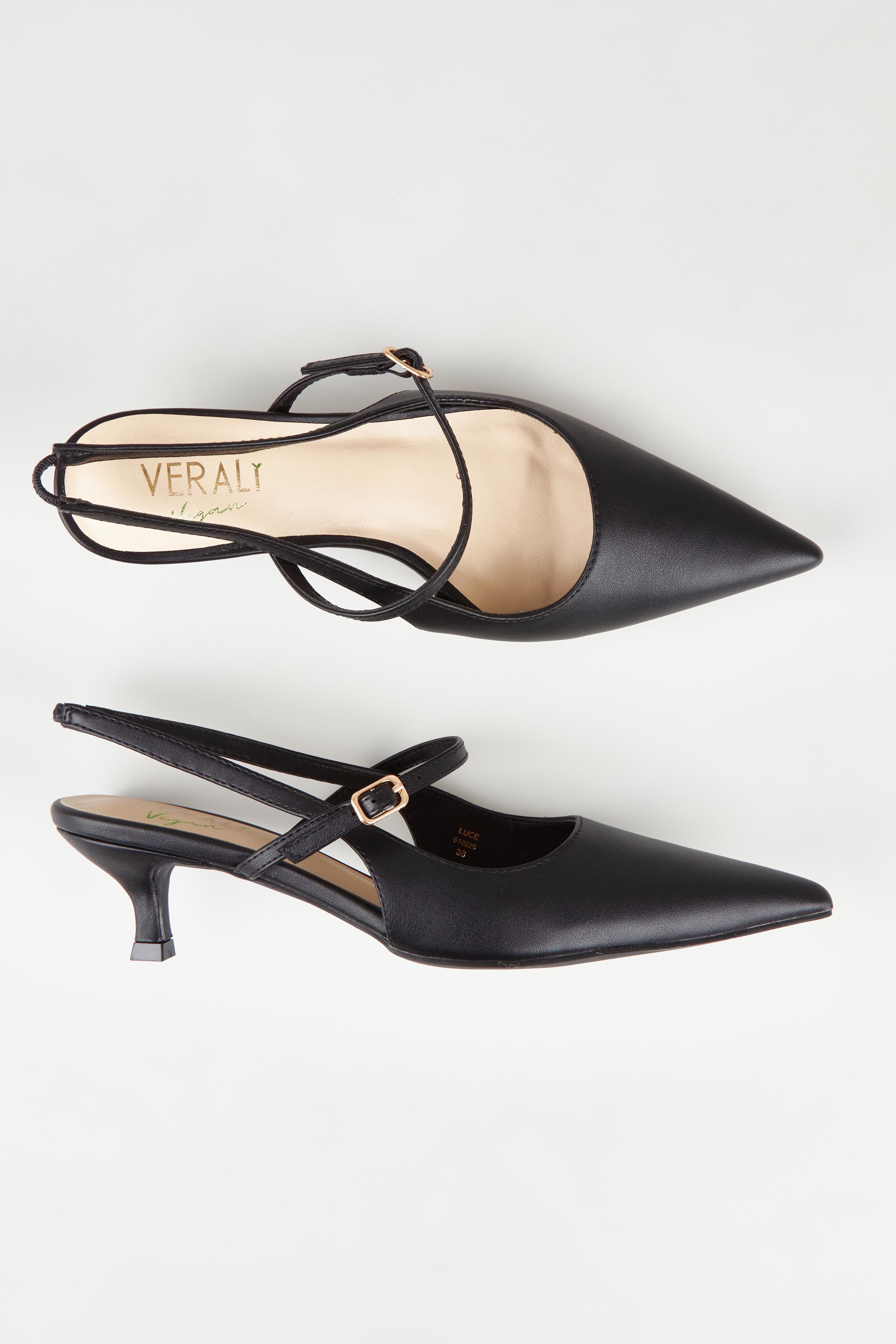 A model wearing size 37 of the Luce Kitten Heel in colour Black (Black), from the front, showing the whole outfit