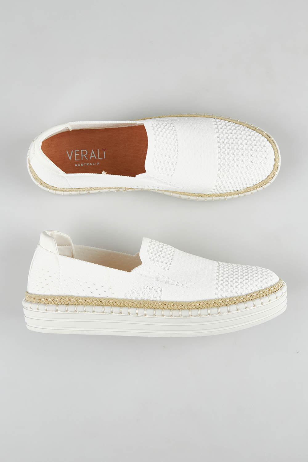 A model wearing size 36 of the Queen Stretch Flat in colour White (White), from the front, showing the whole outfit