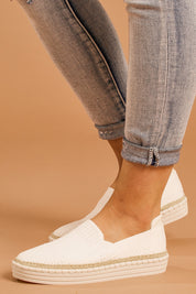 A model wearing size 38 of the Queen Stretch Flat in colour White (White), from the front, cropped image