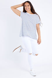 Model Larissa wearing size 10 of the Lucy Ripped Knee High Rise Jean in colour White (White), from the front, showing the whole outfit
