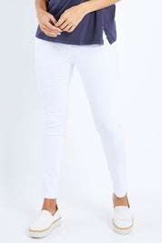 Model Lala wearing size 10 of the Zoey High Rise Skinny Jean in colour White (White), from the front, cropped image