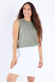 Model Larissa wearing size 10 of the Maggie High Rise Denim Skirt in colour White (White), from the front, cropped image