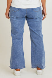 Model Laura wearing size 14 of the Candice Wide Leg Jean in colour Lightblue (Blue), from the back