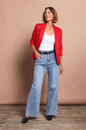 Model Riina wearing size 10 of the Candice Wide Leg Jean in colour Lightblue (Blue), from the front, showing the whole outfit
