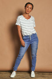 Model Katie wearing size 10 of the Harlow Cargo Jogger in colour Middenim (Blue), from the front, showing the whole outfit