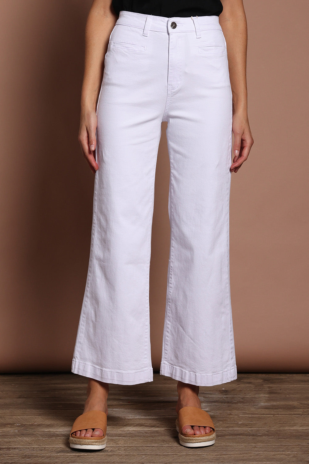 Model Madeline wearing size 9 of the Hayley Highin colourWaisted Wide Leg Jean - White (White), from the front, cropped image