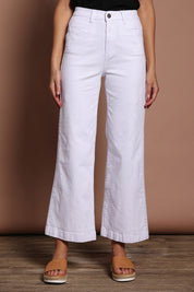 Model Madeline wearing size 9 of the Hayley Highin colourWaisted Wide Leg Jean - White (White), from the front, cropped image