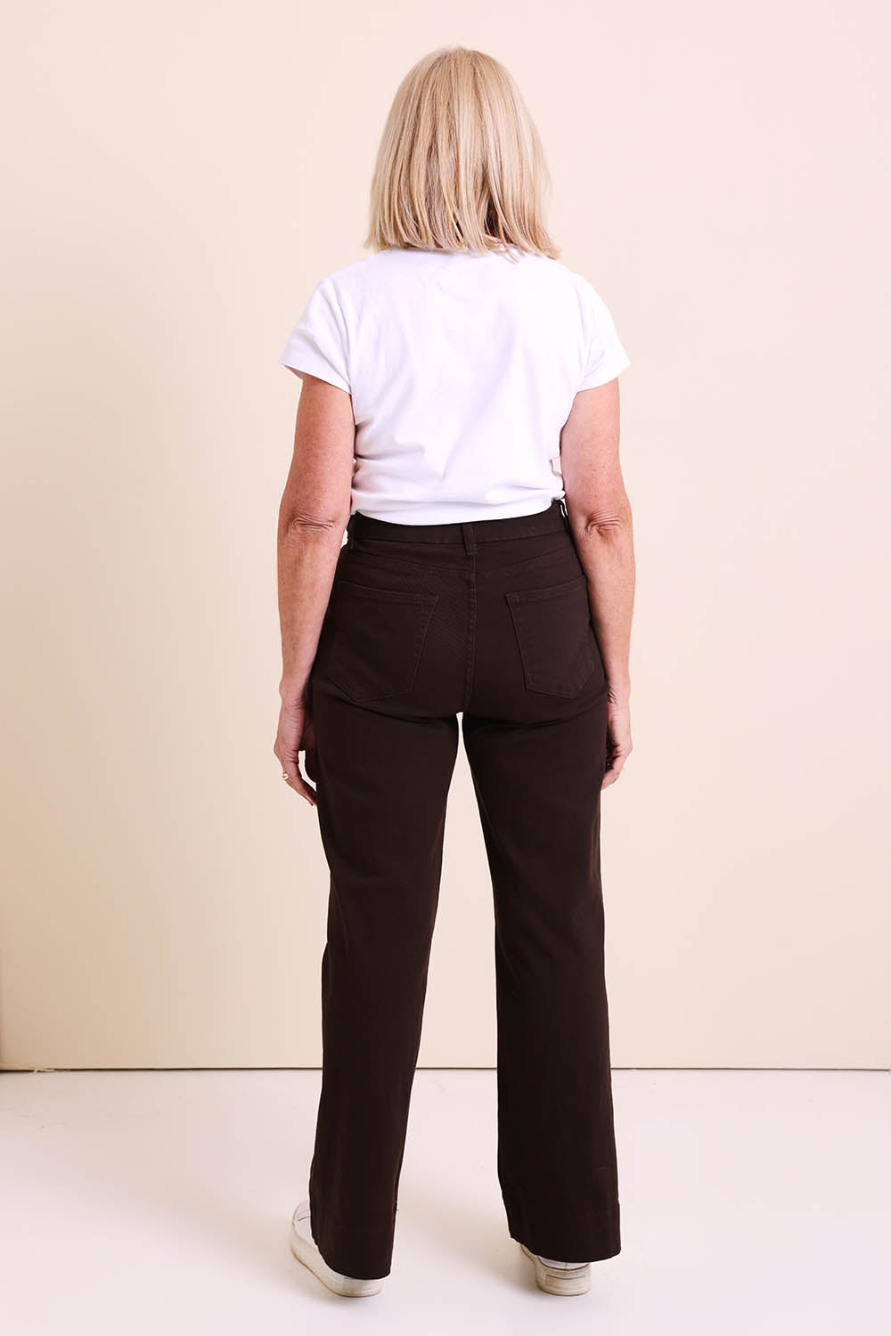 Model Sandys wearing size 10 of the Katie High-waisted Front Pocket Wide Leg Jean - Chocolate in colour Chocolate, from the front