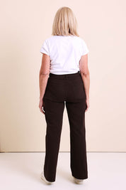 Model Sandys wearing size 10 of the Katie High-waisted Front Pocket Wide Leg Jean - Chocolate in colour Chocolate, from the front