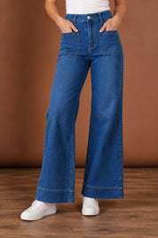 Model Genericm wearing size sample of the Katie High-Waisted Front Pocket Wide Leg Jean - Darkdenim in colour Darkdenim, in a cropped view
