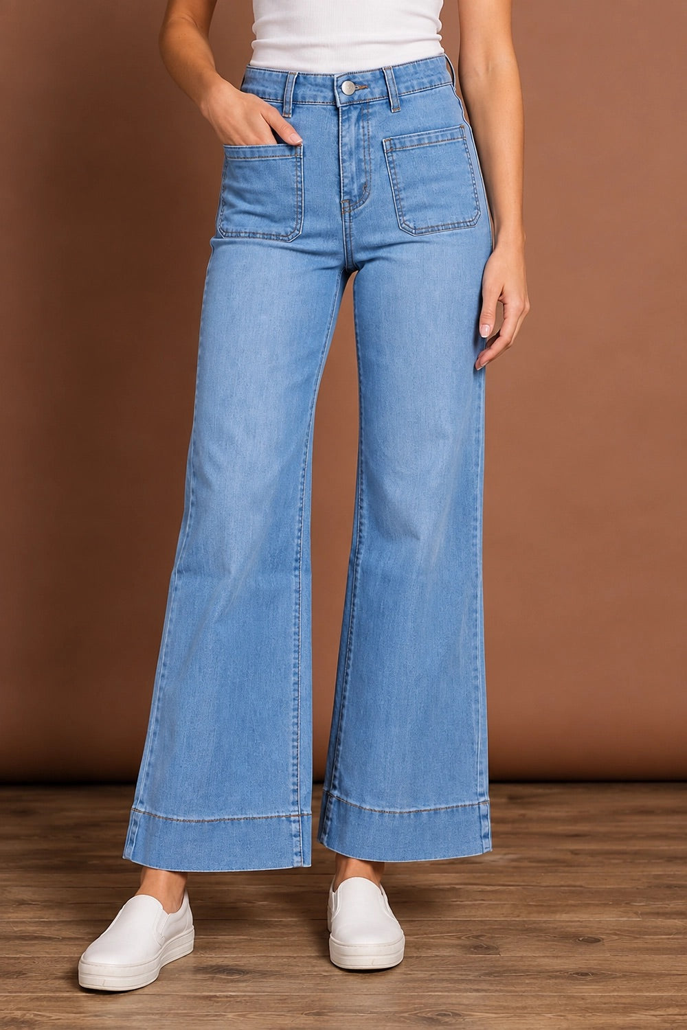 Model Genericm wearing size sample of the Katie High-Waisted Front Pocket Wide Leg Jean - Fadedenim in colour Fadedenim, in a cropped view