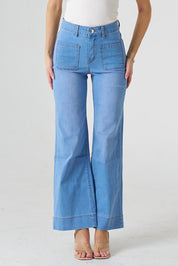 A model wearing the Katie Highin colourWaisted Front Pocket Wide Leg Jean - Fadedenim (Blue), from the front, cropped image