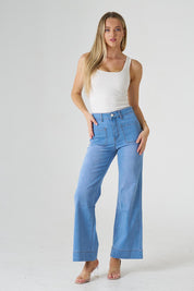 A model wearing the Katie Highin colourWaisted Front Pocket Wide Leg Jean - Fadedenim (Blue), from the front, showing the whole outfit