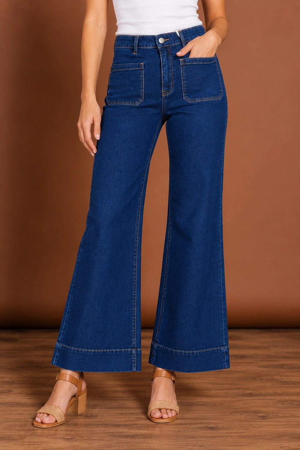 Model Genericm wearing size sample of the Katie High-Waisted Front Pocket Wide Leg Jean - Indigoden in colour Indigoden, in a cropped view