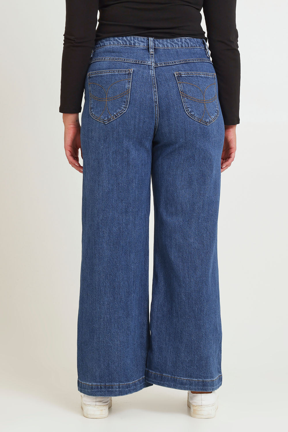 Model Chanel wearing size 16 of the Katie Highin colourWaisted Front Pocket Wide Leg Jean - Middenim (Blue), from the back