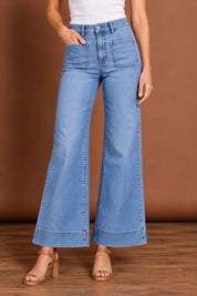 Model Genericm wearing size sample of the Katie High-Waisted Front Pocket Wide Leg Jean - Paledenim in colour Paledenim, in a cropped view