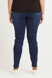 Model Chanel wearing size 16 of the River Ribbed Pull On Jean in colour Darkdenim (Blue), from the back