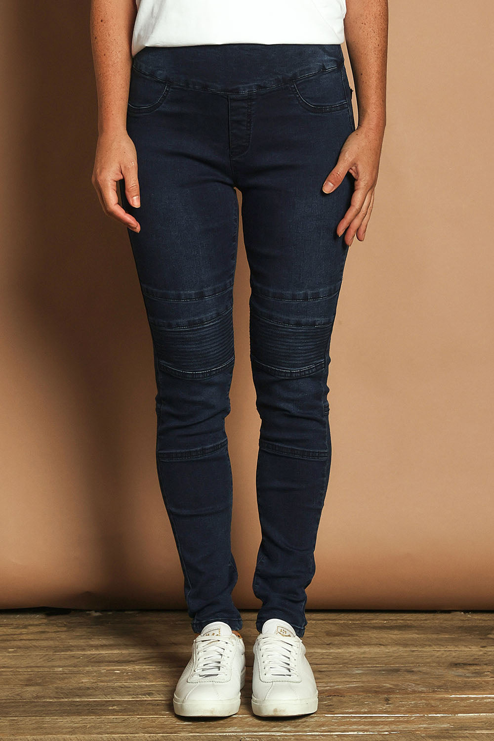 Model Katie wearing size 10 of the River Ribbed Pull On Jean in colour Darkdenim (Blue), from the front, cropped image