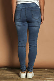 Model Katie wearing size 10 of the River Ribbed Pull On Jean in colour Midblue (Blue), from the back