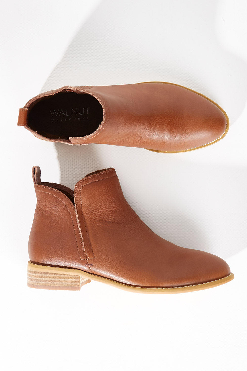 A model wearing size 36 of the Douglas Suede Boot in colour Chocolate, from the front, showing the whole outfit