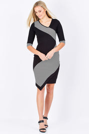 Model Maddy wearing size 10 of The Contrast Striped Ponte Dress in colour BlackWhite (Black), from the front, showing the whole outfit