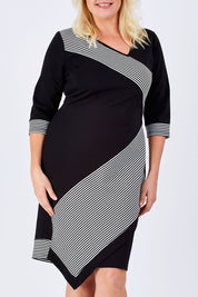 Model Natalie wearing size 16 of The Contrast Striped Ponte Dress in colour BlackWhite (Black), from the front, cropped image