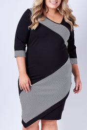 Model Sophie wearing size 20 of The Contrast Striped Ponte Dress in colour BlackWhite (Black), from the front, cropped image