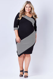 Model Sophie wearing size 20 of The Contrast Striped Ponte Dress in colour BlackWhite (Black), from the front, showing the whole outfit