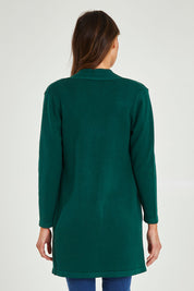 Model Madeline wearing size S of the Long Sleeve Open Cardi in colour Forest (Green), from the back