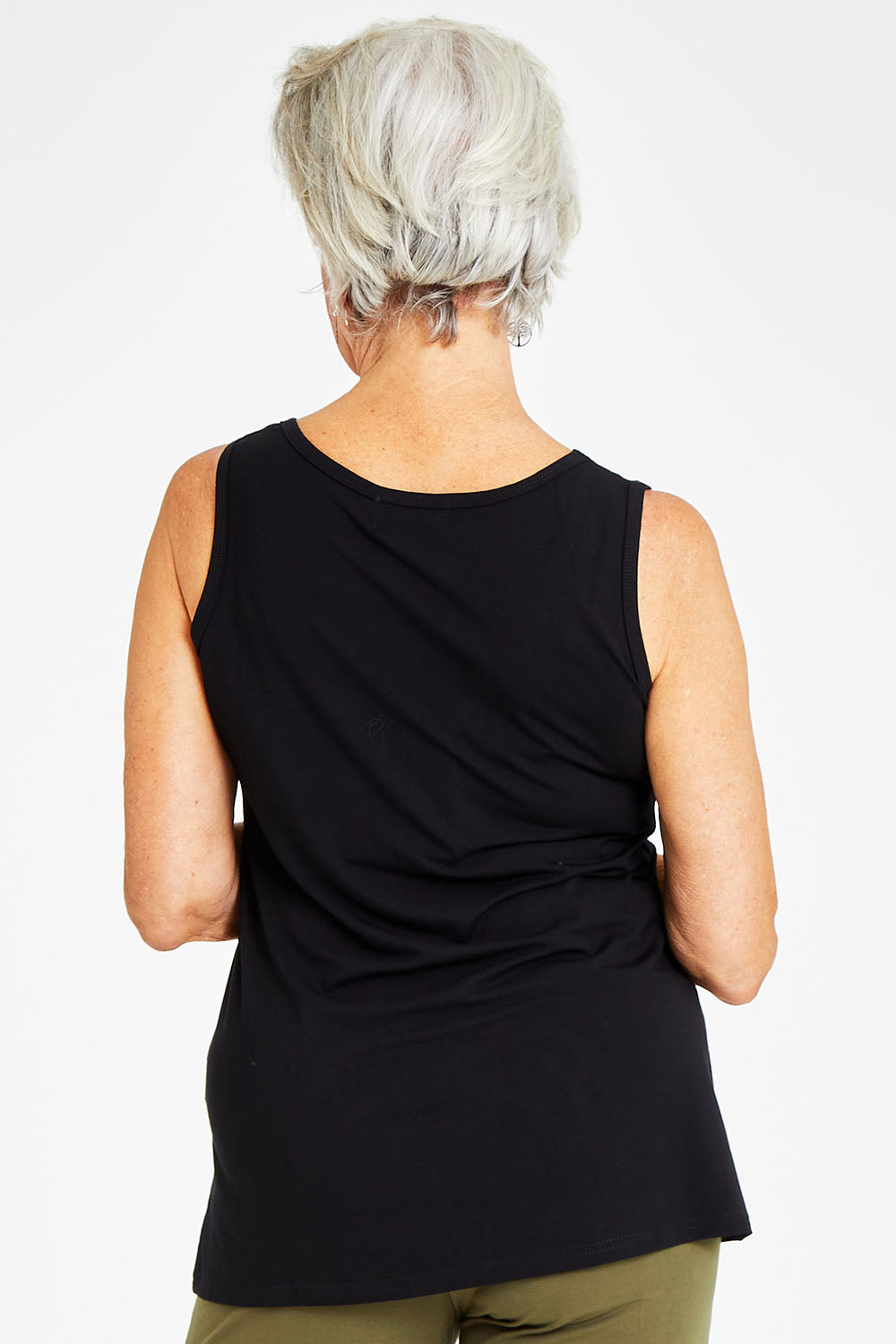 Model Elise wearing size S of the Drape Bamboo Cami in colour Black (Black), from the back