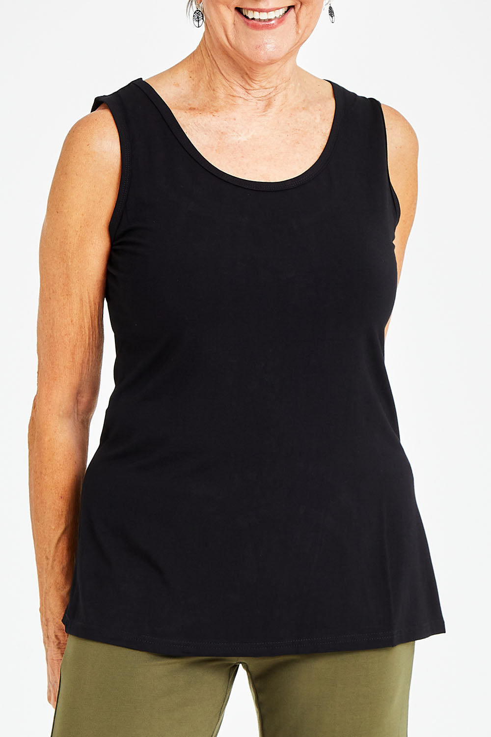 Model Elise wearing size S of the Drape Bamboo Cami in colour Black (Black), from the front, cropped image