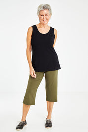 Model Elise wearing size S of the Drape Bamboo Cami in colour Black (Black), from the front, showing the whole outfit