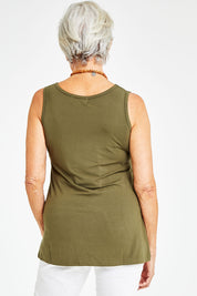 Model Elise wearing size S of the Drape Bamboo Cami in colour Olive (Green), from the back