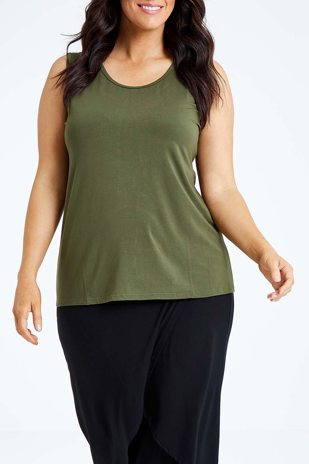 Model Laura wearing size L of the Drape Bamboo Cami in colour Olive (Green), from the front, cropped image