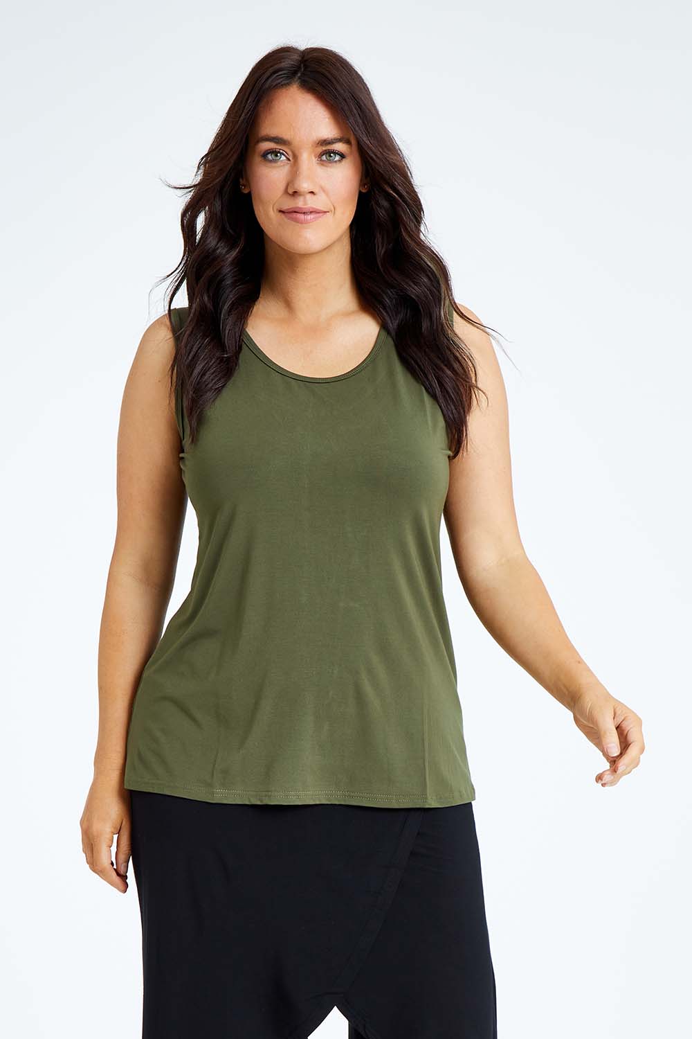 Model Laura wearing size L of the Drape Bamboo Cami in colour Olive (Green), from the front, cropped image