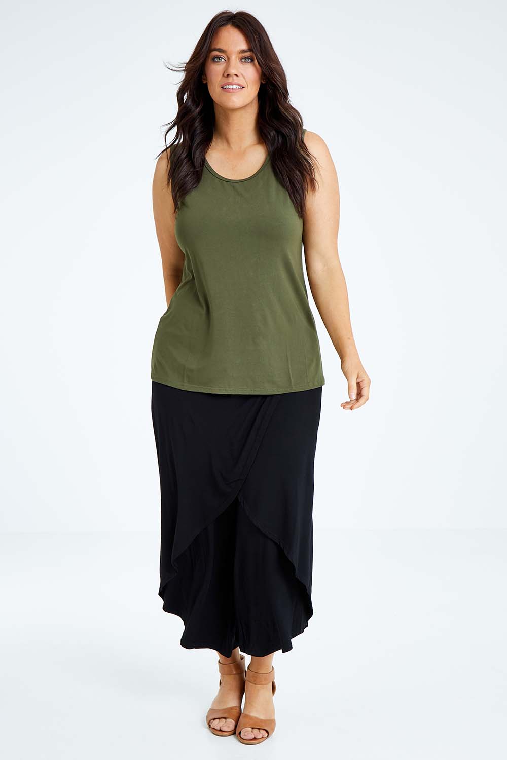 Model Laura wearing size L of the Drape Bamboo Cami in colour Olive (Green), from the front, showing the whole outfit