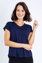 Model Andrea wearing size S of the Cap Sleeve Bamboo Tee in colour Dknavy (Blue), from the front, cropped image