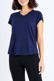 Model Andrea wearing size S of the Cap Sleeve Bamboo Tee in colour Dknavy (Blue), from the front, cropped image