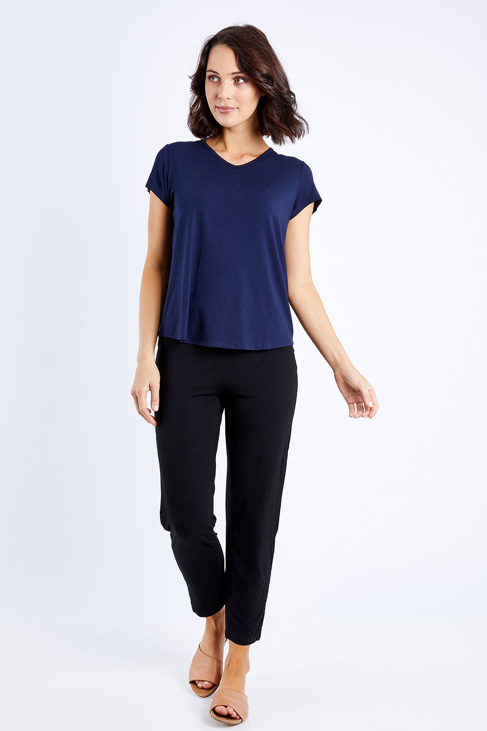 Model Andrea wearing size S of the Cap Sleeve Bamboo Tee in colour Dknavy (Blue), from the front, showing the whole outfit