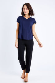 Model Andrea wearing size S of the Cap Sleeve Bamboo Tee in colour Dknavy (Blue), from the front, showing the whole outfit
