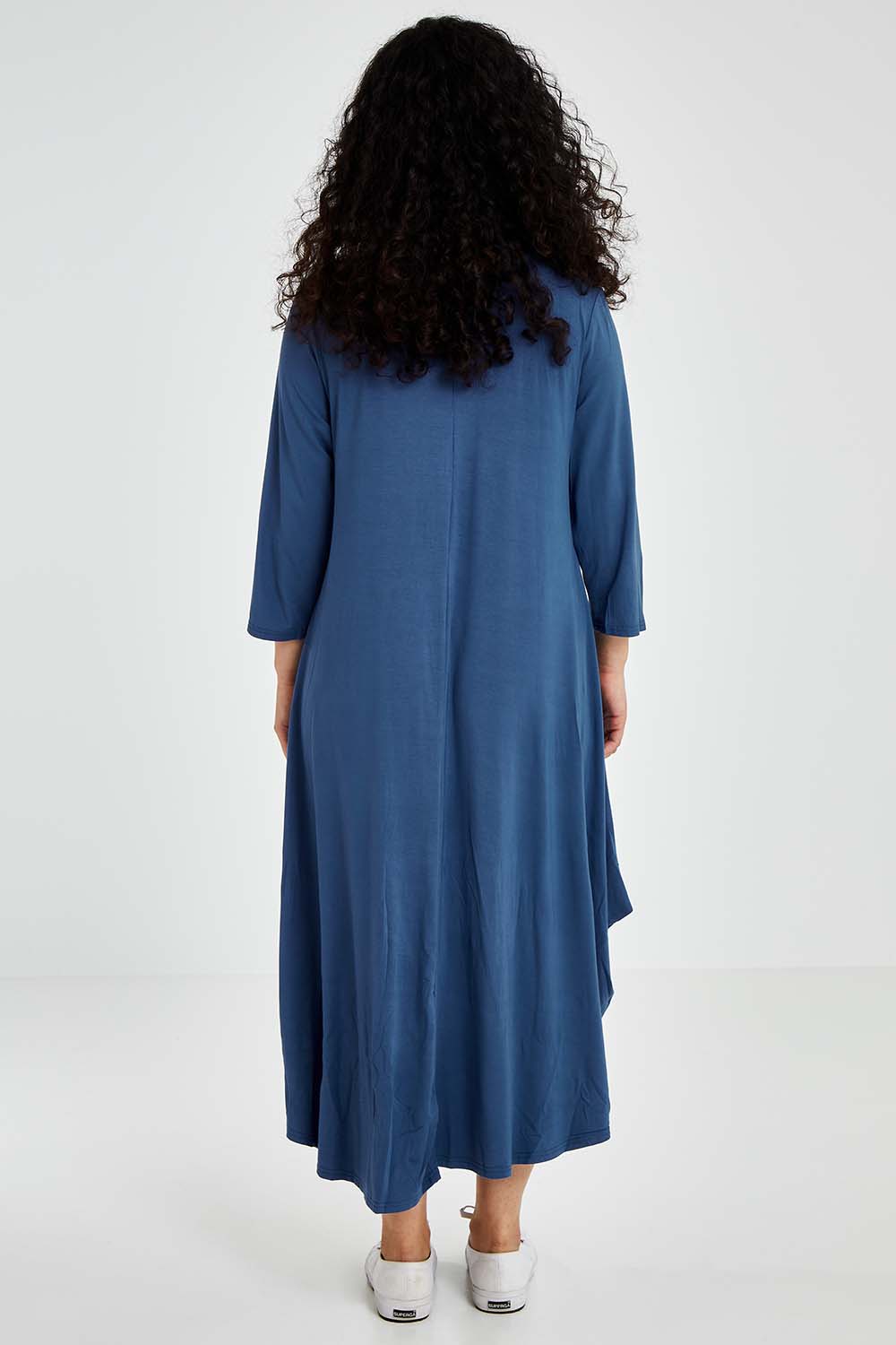 Model Bernadette wearing size S of the 3/4 Sleeve Bamboo Maxi Dress in colour Denim (Blue), from the back