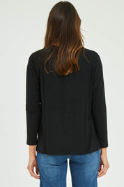 Model Madeline wearing size S of the Raglan Long Sleeve Tee in colour Black (Black), from the back