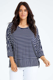 Model Laura wearing size L of the 3/4 Sleeve Stripe Bamboo Top in colour Darknavy (Blue), from the front, cropped image