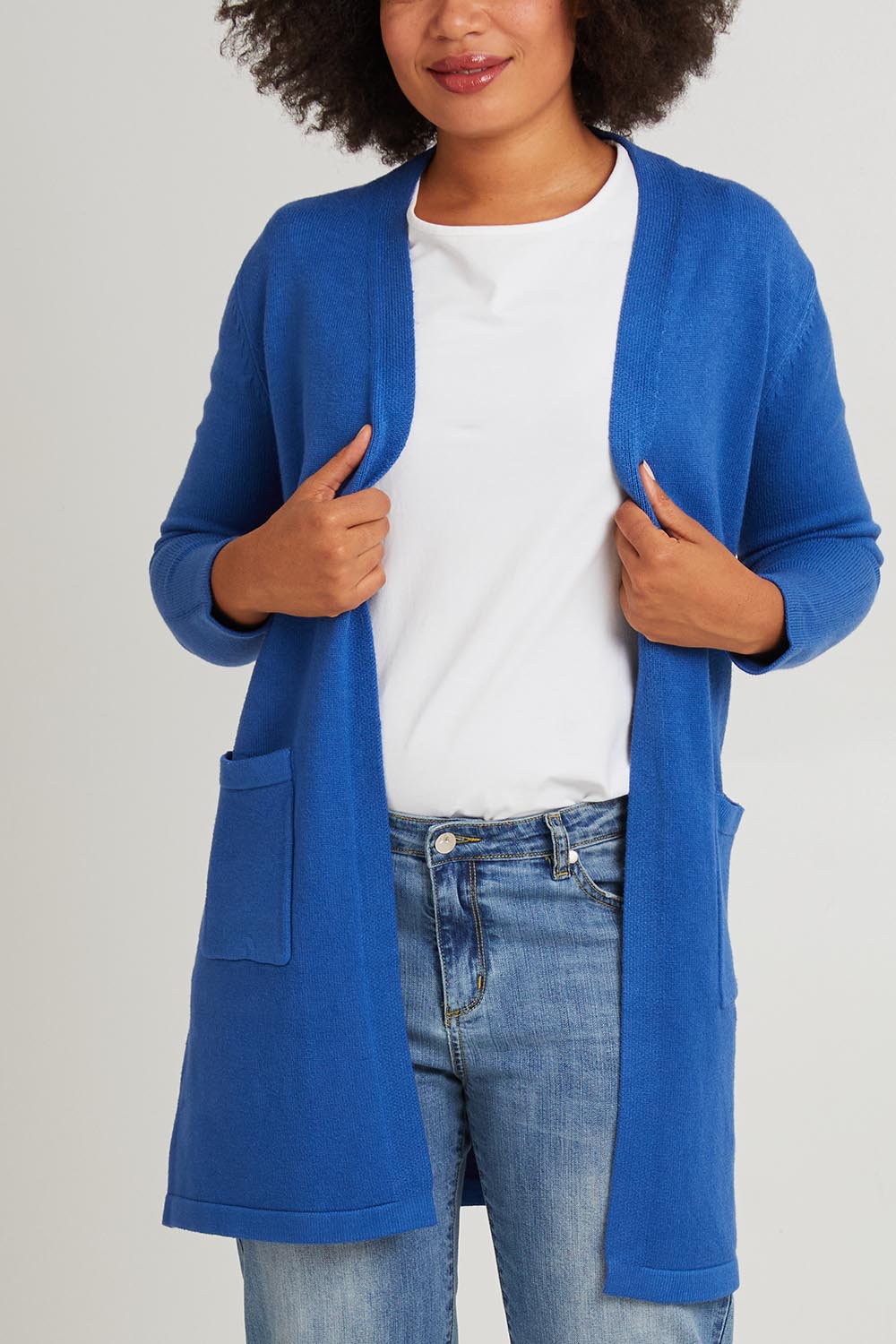 Model Olivia wearing size S of the Long Sleeve Wool Blend Cardigan in colour Denim (Blue), from the front, cropped image