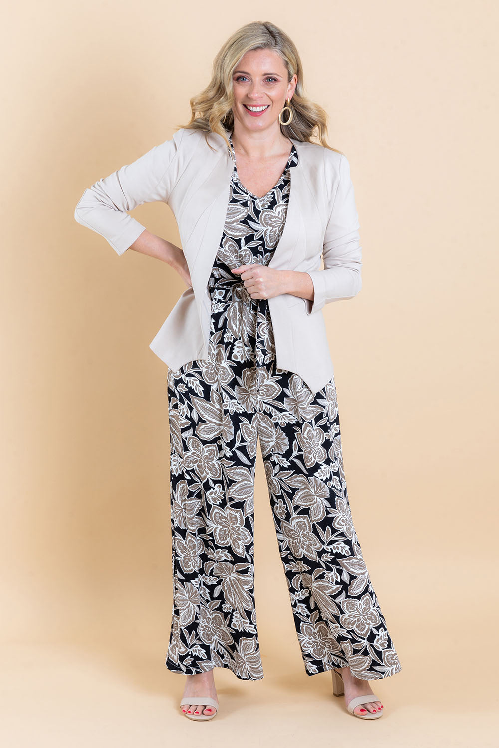 Model Brooke wearing the Persuit Jacket in colour Cream, from the front, showing the whole outfit
