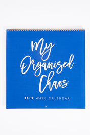 A model wearing size OneSize of the My Organised Chaos Wall Calendar 2019 in colour Sapphire (Blue), from the front, showing the whole outfit