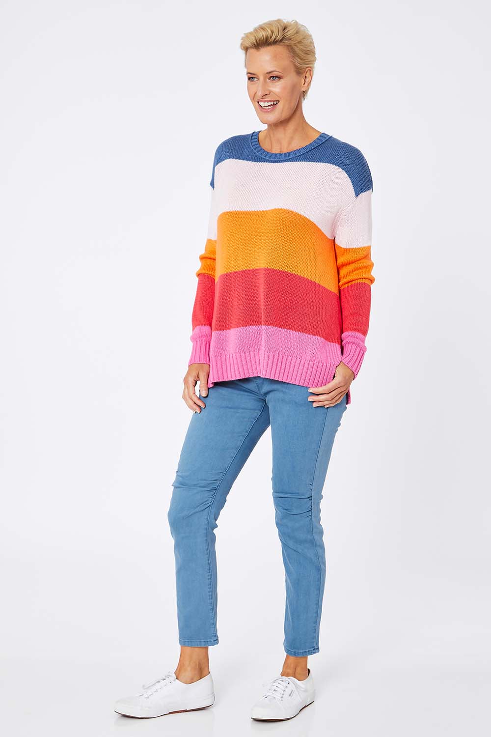 Model Amelia wearing size S of the Mega Stripe Pullover in colour Bubblegum (Pink), from the front, showing the whole outfit