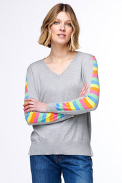 A model wearing the Ladder Sleeve Jumper in colour Heathercom (Grey), from the front, showing the whole outfit